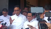 Anies Rasyid Baswedan dan Muhaimin Iskandar di Posko Tim Hukum Nasional (THN) Anies-Muhaimin (AMIN), Jakarta Selatan, Selasa (20/2) (Nur Habibie/Merdeka.com)