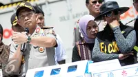 Kapolri Tito Karnavian memberikan keterangan  dalam rilis penggagalan penyelundupan produk perikanan dan bahan pembuat bom di New Port Container Terminal 1, Tanjung Priok Jakarta, Selasa (13/9). (Liputan6.com/Faizal Fanani)