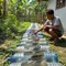 Cara Ternak Ikan Gabus di Galon Bekas/AI