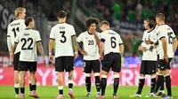 Hingga akhir pertandingan skor 3-1 untuk keunggulan Jerman tidak berubah. Kemenangan ini membuat Die Mannschaft berhasil mengemas tiga poin perdana dari dua laga dan berada di posisi ketiga klasemen sementara Grup A kualifikasi Piala Dunia 2026 zona Eropa. (INA FASSBENDER/AFP)