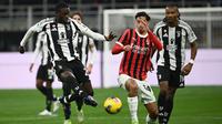 AC Milan dan Juventus harus puas bermain imbang 0-0 pada laga pekan ke-13 Serie A di San Siro, Minggu (24/11/2024) dini hari WIB. (AFP/Isabella BONOTTO)