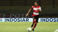 Pemain Madura United, Andik Rendika Rama. (Bola.com/Aditya Wany)