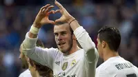 6. Gareth Bale (Real Madrid), 85 juta poundsterling, jika ingin membuktikan diri penyerang sayap asal Wales ini harus mampu lepas dari bayang-bayang Cristiano Ronaldo dan hijrah ke MU merupakan salah satu keputusan yang tepat. (AFP/Curto De La Torre)