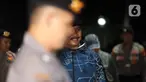 Wali Kota Madiun, Maidi saat tiba di Gedung Merah Putih Komisi Pemberantasan Komisi Pemberantasan Korupsi (KPK), Jakarta, Senin (19/1/2026). Wali Kota Madiun, Maidi, terjaring Operasi Tangkap Tangan (OTT) Komisi Pemberantasan Korupsi (KPK) pada Senin 19 Januari 2026. (Liputan6.com/Helmi Fithriansyah)