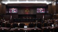 Suasana sidang pendahuluan sengketa hasil Pemilu Legislatif 2019 di gedung MK, Jakarta, Rabu (10/7/2019). Sidang tersebut beragendakan pemeriksaan pendahuluan terkait Perselisihan Hasil Pemilihan Umum DPR-DPRD Provinsi Sulawesi Barat. (Liputan6/Johan Tallo)