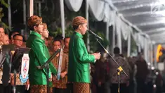 Presiden Jokowi memberikan sambutan pada acara serah terima Paningset dan Midodareni pernikahan Kahiyang Ayu dan Bobby Nasution di kediamannya di Surakarta, Selasa (7/11). (Liputan6.com/Angga Yuniar)