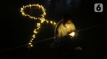 FOTO: Nyala Lampu Malam Renungan Hari AIDS Sedunia