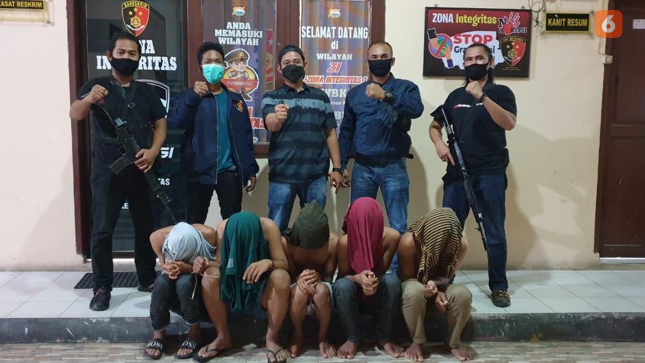 Foto para pelaku pencabulan usai ditangkap polisi (Liputan6.com/Fauzan)