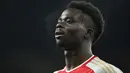 Pemain Arsenal, Bukayo Saka saat laga lanjutan Liga Inggris 2023/2024 melawan Newcastle di Emirates Stadium, London, Inggris, Minggu (25/02/2024) dini hari WIB. (AFP/Justin Tallis)