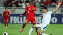 Delapan menit berselang, Irak mampu menyamakan kedudukan setelah sundulan Zaid Tahseen mampu menjebol gawang timnas Indonesia yang dikawal Ernando Ari. (Karim JAAFAR/AFP)