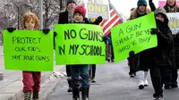 Protes penggunaan senjata api yang memakan korban anak-anak yang terjadi di Amerika Serikat tahu 2015 (AFP)