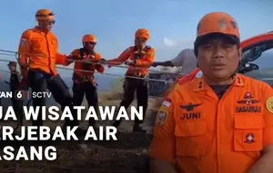 Dua Wisatawan Terjebak Air Pasang
