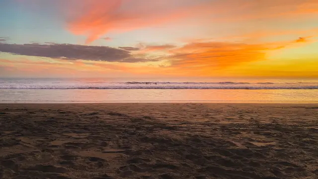 Ilustrasi senja di pantai Parangtritis