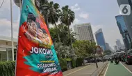 Sejumlah pihak menilai pemasangan spanduk dianggap sebagai upaya memperkuat citra di mata publik, terutama di momen transisi politik yang penting. (Liputan6.com/Angga Yuniar)