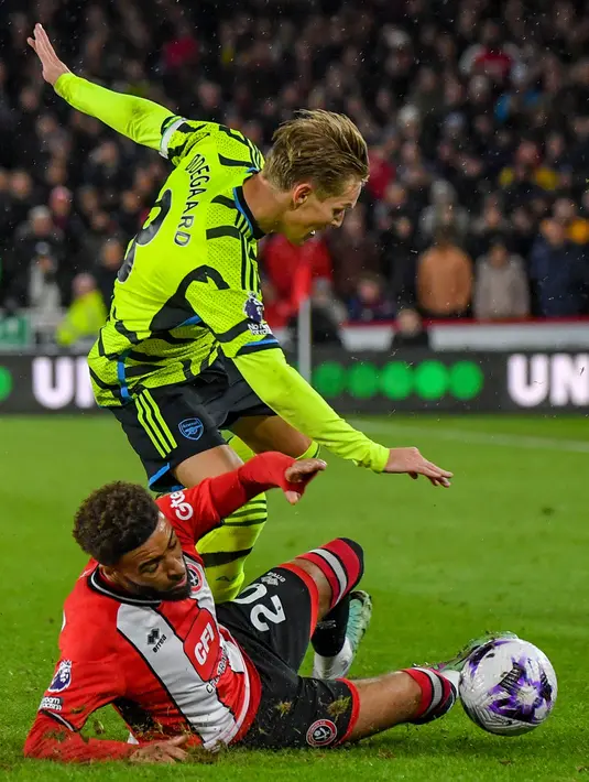 Di babak pertama, Arsenal sudah unggul dengan melesakkan empat gol ke gawang Sheffield United ditambah satu gol bunuh diri dari pemain Sheffield United. (AP Photo/Rui Vieira)