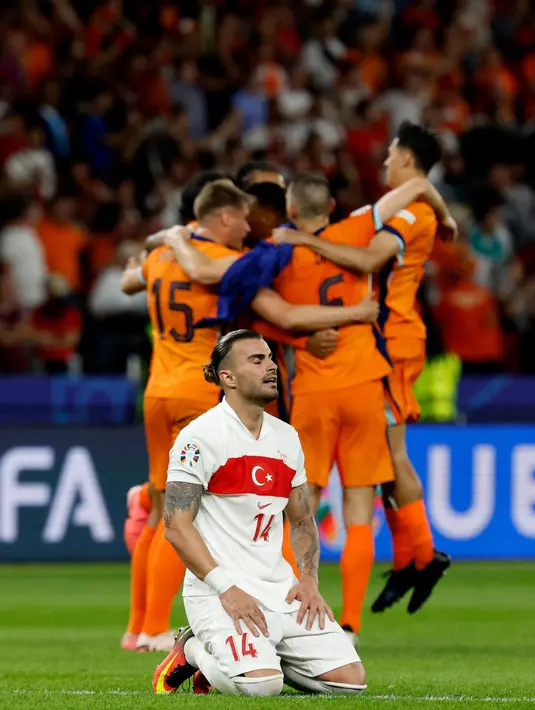 Hingga akhir pertandingan, skor 2-1 untuk kemenangan Belanda tidak berubah. (Odd ANDERSEN/AFP)