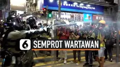 Ketegangan meningkat antara polisi dan wartawan di Hong Kong. Saat protes pro-demokrasi yang terjadi di Causeway Bay, polisi mendorong mundur para wartawan dengan cara menyemprotkan cairan lada.