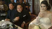 Feby Febiola dan Franky Sihombing akhirnya resmi menjadi suami istri. [Foto: Rizky Aditya Saputra/Liputan6.com]