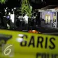 Suasana di sekitar lokasi penggerebekan dan penembakan terduga teroris di Setu, Tangerang Selatan, Banten, Rabu (21/12). Densus 88 melakukan baku tembak yang akhirnya menewaskan tiga orang terduga teroris. (Liputan6.com/Helmi Afandi)