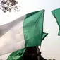 Bendera Nigeria (AFP Photo / Sodiq Adelakuin)