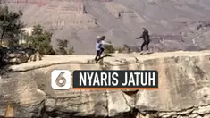 Momen menegangkan terjadi saat seorang remaja dan ibunya akan mengambil gambar di Grand Canyon, Arizona, AS. Tiba-tiba, remaja tersebut terpeleset yang membuatnya nyaris terjatuh dari tebing.