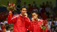 Hendra Setiawan/Markis Kido meraih medali emas cabang bulu tangkis nomor ganda putra di Olimpiade Beijing 2008. (http://wiki.ttymq.com)