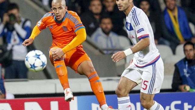 Sofiane Feghouli pemain sayap Valencia asal Aljazair mencetak gol indah yang membuat Valencia menang atas Lyon 1-0 di Liga Champions, Selasa (29/9/2015).