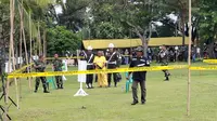 Oknum prajurit TNI, Kopda Bazarsyah di rekontruksi penembakan 3 anggota polisi saat grebek judi sabung ayam. Foto : (Liputan6.com/Ardi).