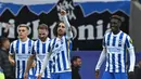 Brighton and Hove Albion. Klub berjuluk The Seagulls ini mengakhiri musim 2021/2022 dengan menempati posisi ke-9 di klasemen akhir dan merupakan raihan terbaik sepanjang sejarah klub. Sebelumnya klub asuhan Graham Potter tersebut lebih sering finis di posisi papan bawah. Salah satu kemenangan spektakuler Marc Cucurella dan kawan-kawan diraih saat menghancurkan Manchester United 4 gol tanpa balas di pekan ke-36 (7/5/2022). (AFP/Glyn Kirk)