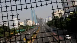 Sejumlah jalan protokol Ibu Kota tampak lengang karena bertepatan dengan libur Hari Raya Idul Adha 1435 H, Jakarta, (5/10/14). (Liputan6.com/Johan Tallo)