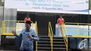Plt Gubernur DKI Jakarta Basuki Tjahaja meresmikan logo baru TransJakarta, Senin (10/11/2014) (Liputan6.com/Herman Zakaria)