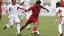 Gelandang Indonesia, Saddil Ramdani, berusaha melewati pemain Yordania pada laga persahabatan di Stadion Wibawa Mukti, Jawa Barat,  Sabtu (13/10/2018). Indonesia menang 3-2 atas Yordania. (Bola.com/M Iqbal Ichsan)