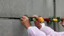 Pada 9 November 1989, Tembok Berlin runtuh. (Odd ANDERSEN/AFP)