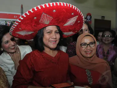 Ibu negara, Iriana Joko Widodo saat di acara amal ke 47 Women International Club (WIC) di JCC, Jakarta, Rabu (19/11/2014). (Liputan6.com/Herman Zakharia)