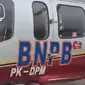 Tangkapan layar helikopter BNPB yang dipakai Ketua DPRD Riau ke Kabupaten Bengkalis. (Liputan6.com/M Syukur)