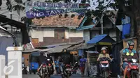 Suasana jelang Idul Adha di kawasan Johar Baru, Jakarta (23/9/2015). Petugas Resort Johar Baru akan mengamankan kawasan yang menjadi tempat tawuran antara Kampung Rawa dan Tanah Tinggi 12 (Liputan6.com/Gempur M Surya)