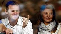 This file photo taken on June 1, 2008 shows Wayne Rooney and fiance Coleen McLoughlin watching from a private hospitality box as The Zutons perform at Anfield, during the Liverpool Sound Concert in northwest England. AFP PHOTO/PAUL ELLIS 