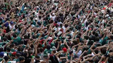 Para penggemar Meksiko bersorak saat berkumpul untuk menonton pertandingan babak 32 besar Piala Dunia 2026 antara Meksiko dan Ekuador di Fan Fest di Guadalajara, negara bagian Jalisco, Meksiko, pada 1 Juli 2026. (Ulises RUIZ/AFP)