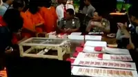 Polres Denpasar Ringkus Pembuat dan Pengedar Uang Palsu