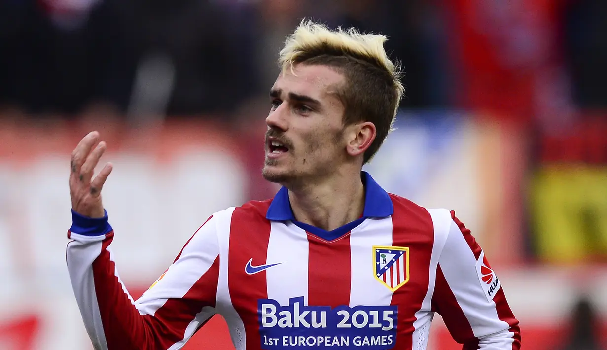 Antoine Griezmann merubah gaya rambutnya ketika bermain untuk Atletico Madrid pada tahun 2015. (Photo by Dani Pozo / AFP)