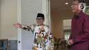 Cak Imin dan Wakil Presiden (wapres) era pemerintahan kedua Susilo Bambang Yudhoyono atau SBY itu  lalu bersalaman dan berfoto bersama sebelum melangsungkan obrolan tertutup dari awak media. (Liputan6.com/Faizal Fanani)