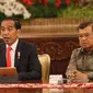 Presiden Joko Widodo didampingi Wapres Jusuf Kalla memberikan keterangan pers terkait rencana pemindahan Ibu Kota Negara di Istana Negara, Senin (26/8/2019). Jokowi secara resmi mengumumkan keputusan pemerintah untuk memindahkan ibu kota negara ke Kalimantan Timur. (Liputan6 com/Angga Yuniar)