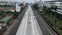 Suasana pembangunan Mass Rapid Transportation (MRT) koridor Lebak Bulus-Bundaran HI, Jakarta, Minggu (13/8). Pengerjaan proyek MRT Fase I dari Lebak Bulus ke Bundaran HI sepanjang 15,7 km terus dikebut oleh PT MRT Jakarta. (Liputan6.com/Herman Zakharia)