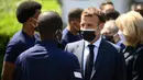 N'Golo Kante pun tak luput dari perhatian dari Presiden Macron. Nama Kante menjadi perbincangan seiring kesuksesan Chelsea meraih titel Liga Champions. Presiden Macron, ikut turun tangan dalam kampanye agar bintang Chelsea, N’Golo Kante, menjadi peraih Ballon d’Or 2021. (Foto: AFP/Pool/Franck Fife)