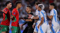 Tampil militan dengan kecepatan dan kelincahan serta ketajaman pemainnya, Timnas Maroko mampu unggul 2-0  atas Argentina sejak paruh babak pertama. (Javier TORRES/AFP)