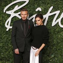 David dan Victoria Beckham di karpet merah British Fashion Awards 2014, London, Inggris. (JUSTIN TALLIS / AFP)