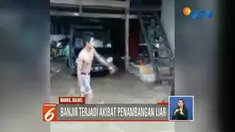 Warga korban banjir bandang di Maros, Sulawesi Selatan, hanya bisa pasrah melihat rumah mereka rusak. Bahkan harta benda dan hewan ternak ikut hanyut terbawa arus.