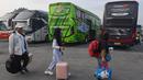 Menggunakan 31 bus dari Terminal Pondok Cabe, Tangerang Selatan, Banten, pemudik akan diantar menuju beberapa kota di Jawa Barat, Jawa Tengah hingga Jawa Timur. (merdeka.com/Arie Basuki)