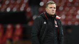 Eddie Howe merupakan sosok penting dibalik kesuksesan Bournemouth naik ke kasta pertama Liga Inggris. Ia juga mampu meracik permainan yang ciamik bersama The Cherries walaupun hanya bertahan dua musim saja. Saat ini, Eddie Howe tidak sedang melatih klub manapun. (AFP/Oli Scarff)
