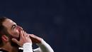 Ekspresi pemain Juventus, Gonzalo Higuain, setelah mencetak gol kemenangan atas AS Roma dalam laga pekan ke-17 Serie A 2016-2017 di Juventus Stadium, Sabtu (17/12/2016) waktu setempat. (AFP/Marco Bertorello)